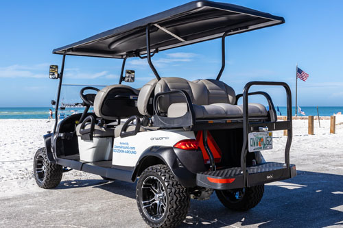 6pass1 A golf cart with seats and a canopy.